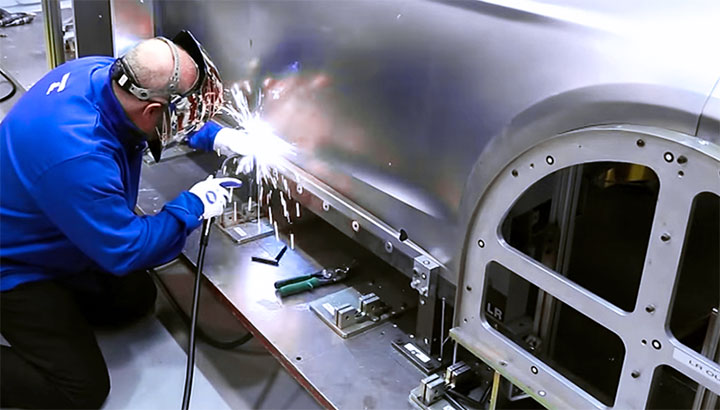 welder MIG welding on sheet metal